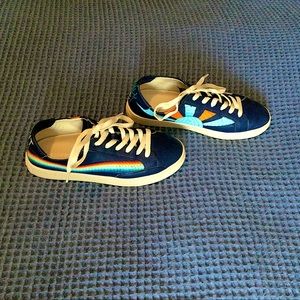 Navy women’s sneakers with decals
